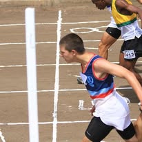 Young athlete sprinting in a race